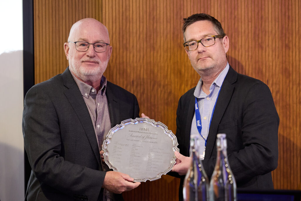 The HFMA awards Graham Keen its highest accolade for services to the Natural Health Industry. Graham Keen and Steve Mann, HFMA Chair, holding the Silver Tray.